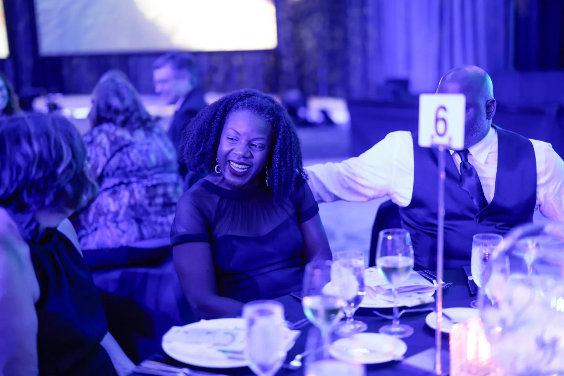 woman smiling at table at the Indianapolis Prize Gala