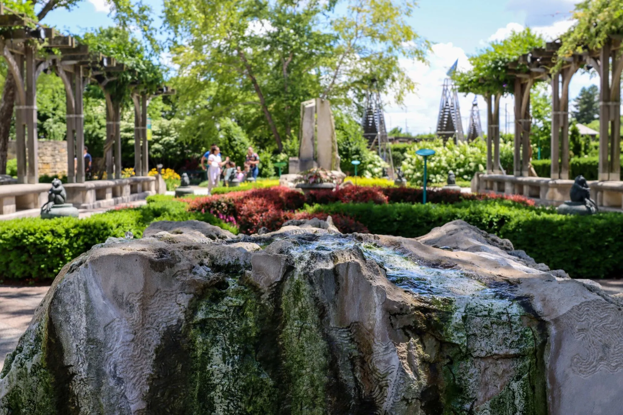 DeHaan Tiergarten with limestone fountain in foreground at White River Gardens