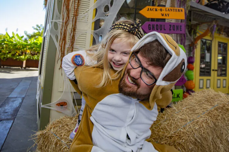 dad and daughter in costume at zooboo