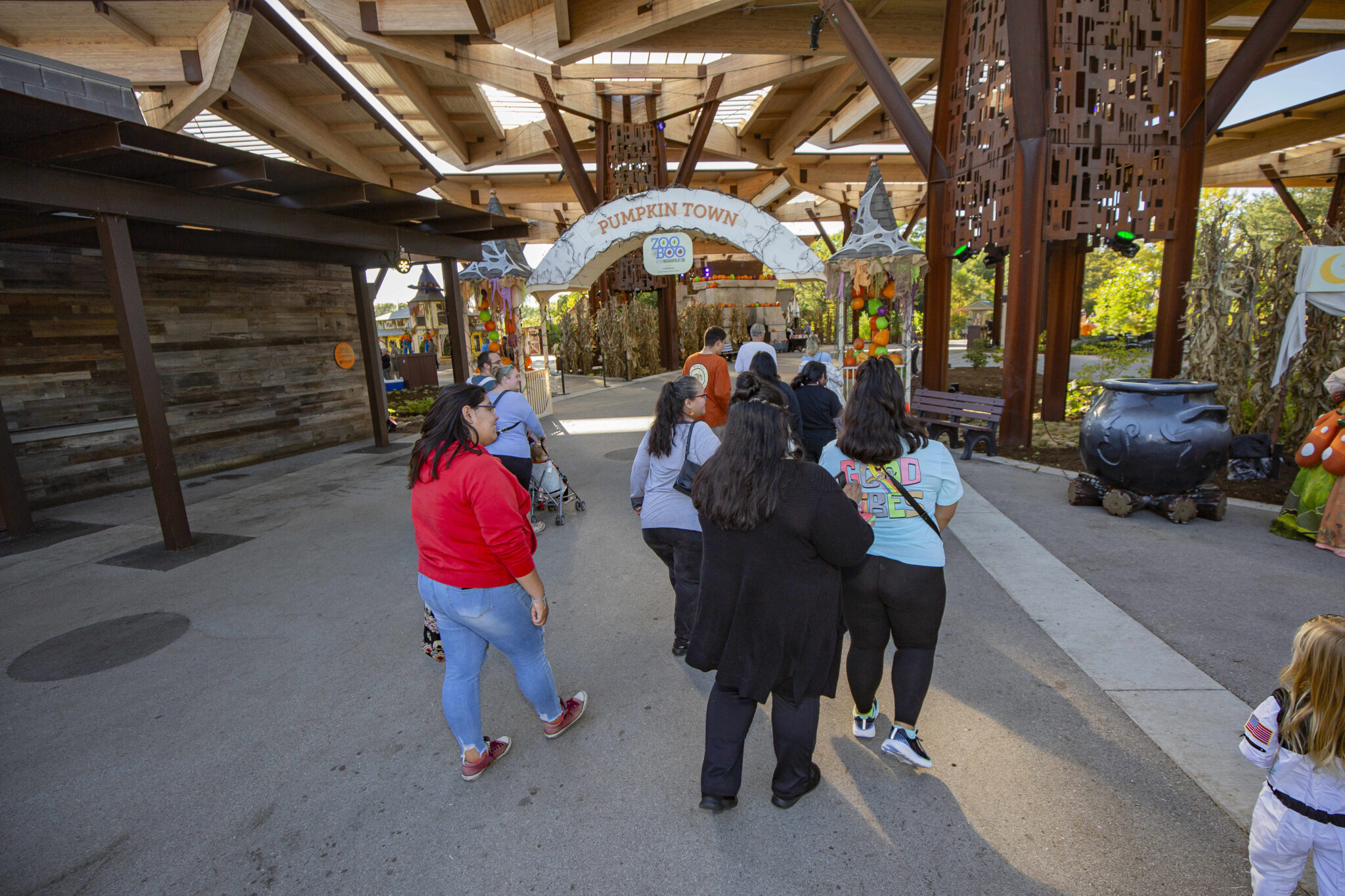 people walking through pumpkin town at zooboo