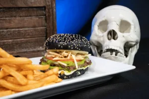 chimi scurry zooboo burger on plate with fries