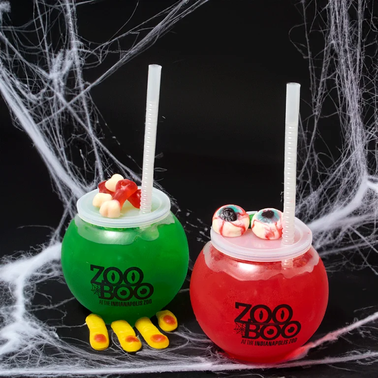 red and green halloween drinks with straws